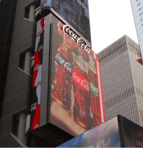 three-dimensional Coca-Cola billboard