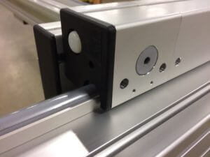 Armoloy coated rail and cart roller assemblies
